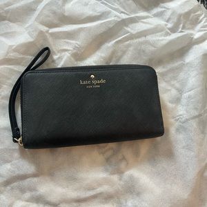 Authentic Kate Spade wristlet wallet. Gently used, lots of life in it.